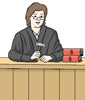 Richterin sitzend hinter Richterpult